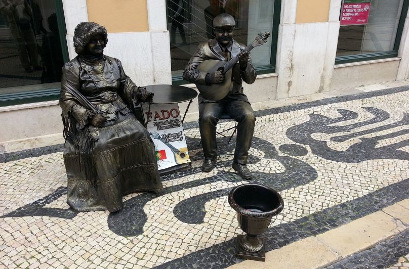 Fado-statuer i Lissabon.